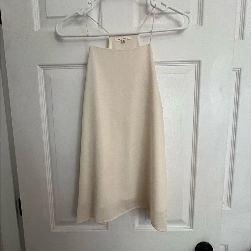 Francesca’s sleeveless high neck top